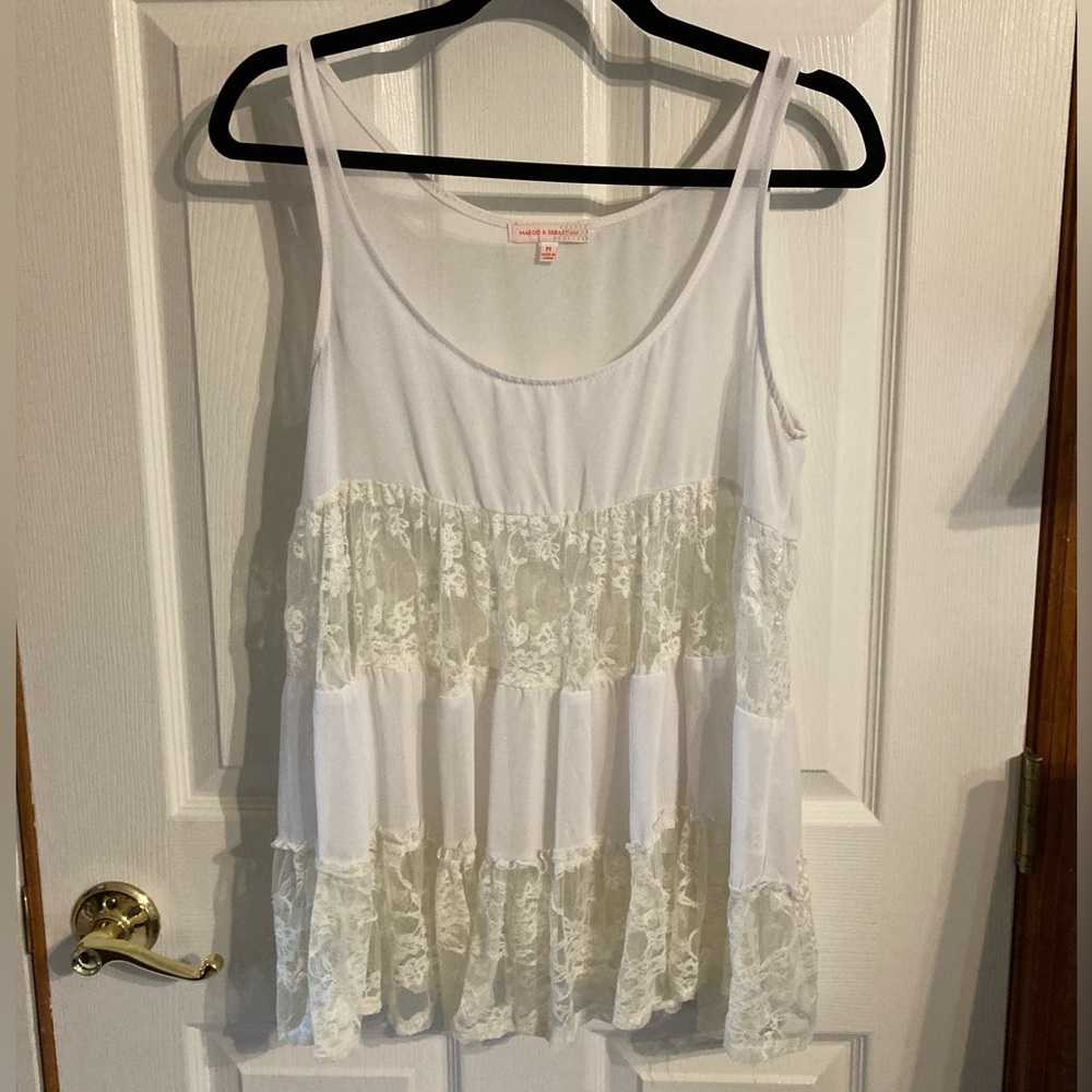 Lady size medium white airline tank top with horizontal stripes of lace